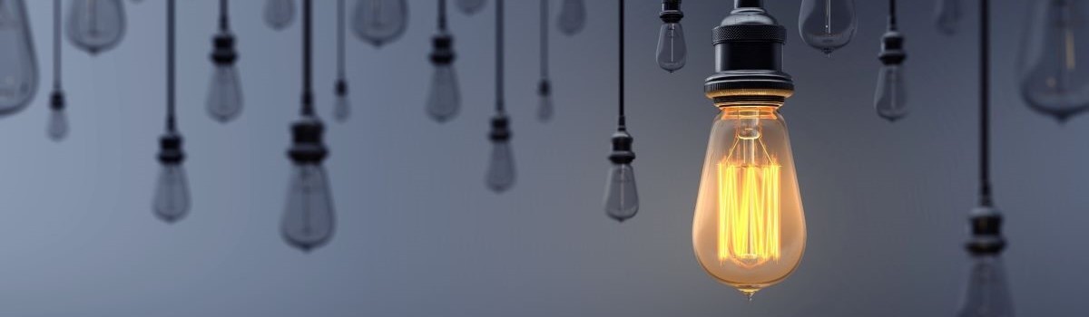 Lightbulbs with one bulb lit