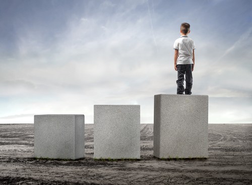Image of a child on a stand