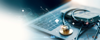 stethoscope on top of laptop